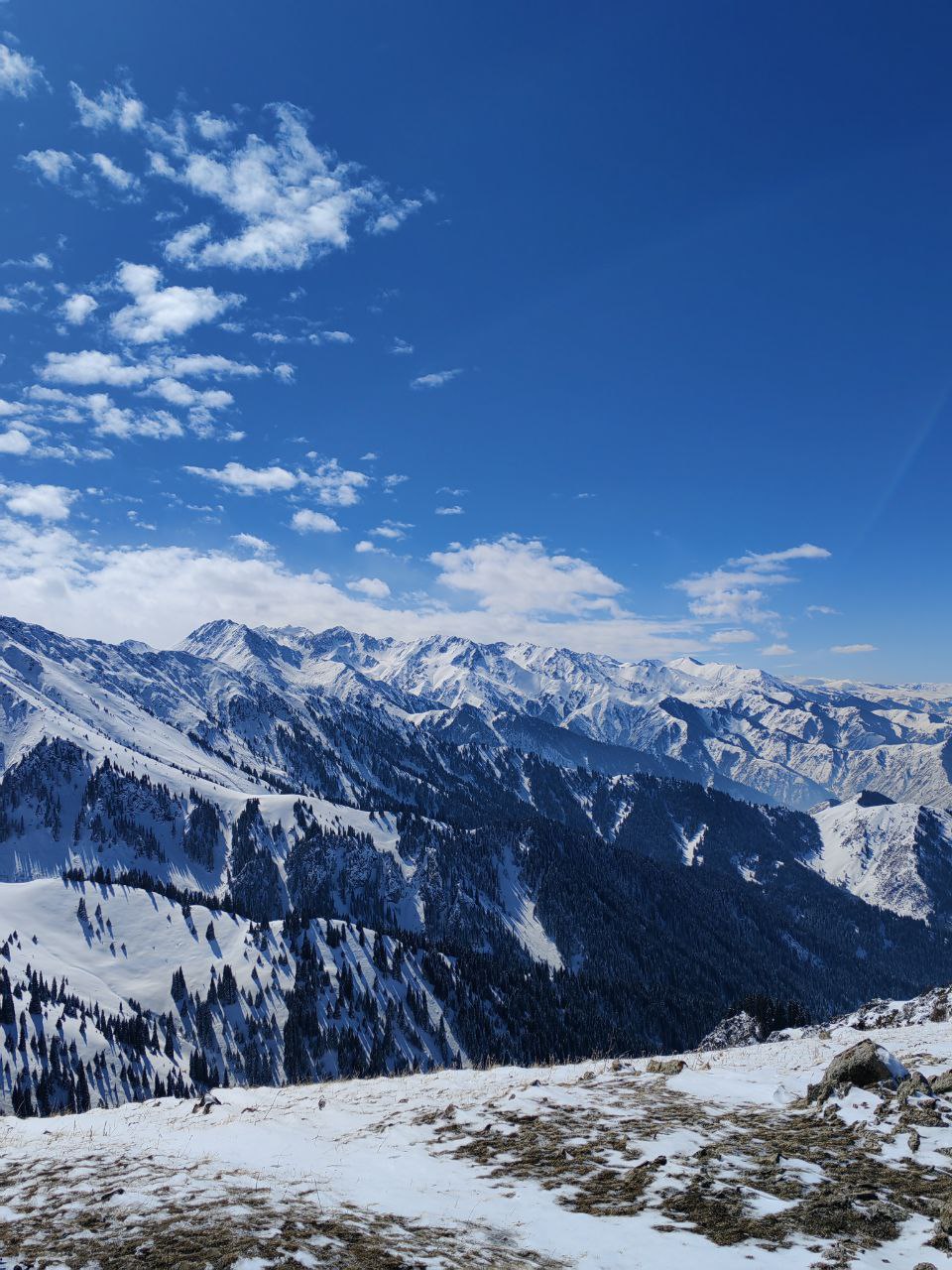 A scenic view of Three Brothers Peak with its iconic rock formations on Kumbel Ridge