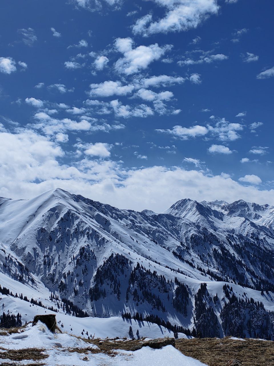 A scenic view of Three Brothers Peak with its iconic rock formations on Kumbel Ridge